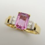 18ct yellow gold 1.00 carat pink sapphire and baguette diamond ring.