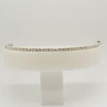 Large and impressive, extra-long diamond tennis bracelet of 15.10 carats, in 18ct white gold.