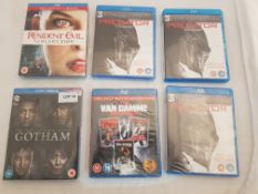 4 x Blu ray DVDs to included The Resident evil collection, 3 x Predator trilogy, The van Damm...