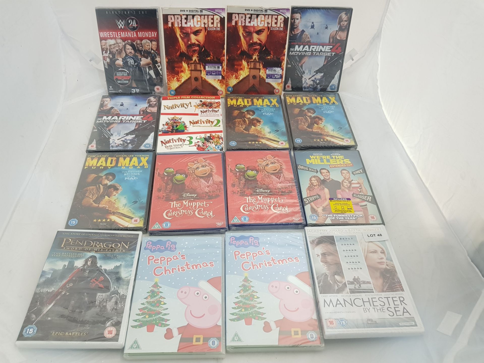 16 x Asst DVDs to include Peppa's Christmas, Mad Max, Manchester by the Sea, Preacher, WWF...