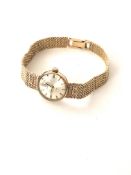 Ladies 9K Gold Omega Watch And Watchband.