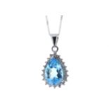 9ct White Gold Diamond And Blue Topaz Pendant