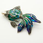 A silver plique-à-jour flying fish brooch set with a cultured pearl and marcasite stones