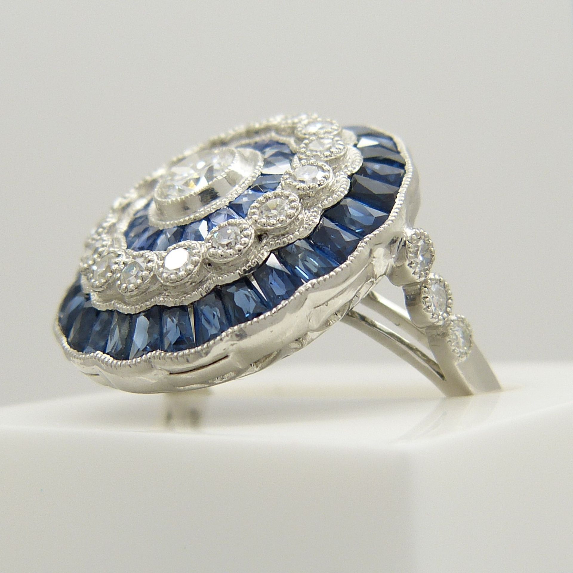 A large platinum floral-style diamond and sapphire cocktail ring - Image 5 of 7