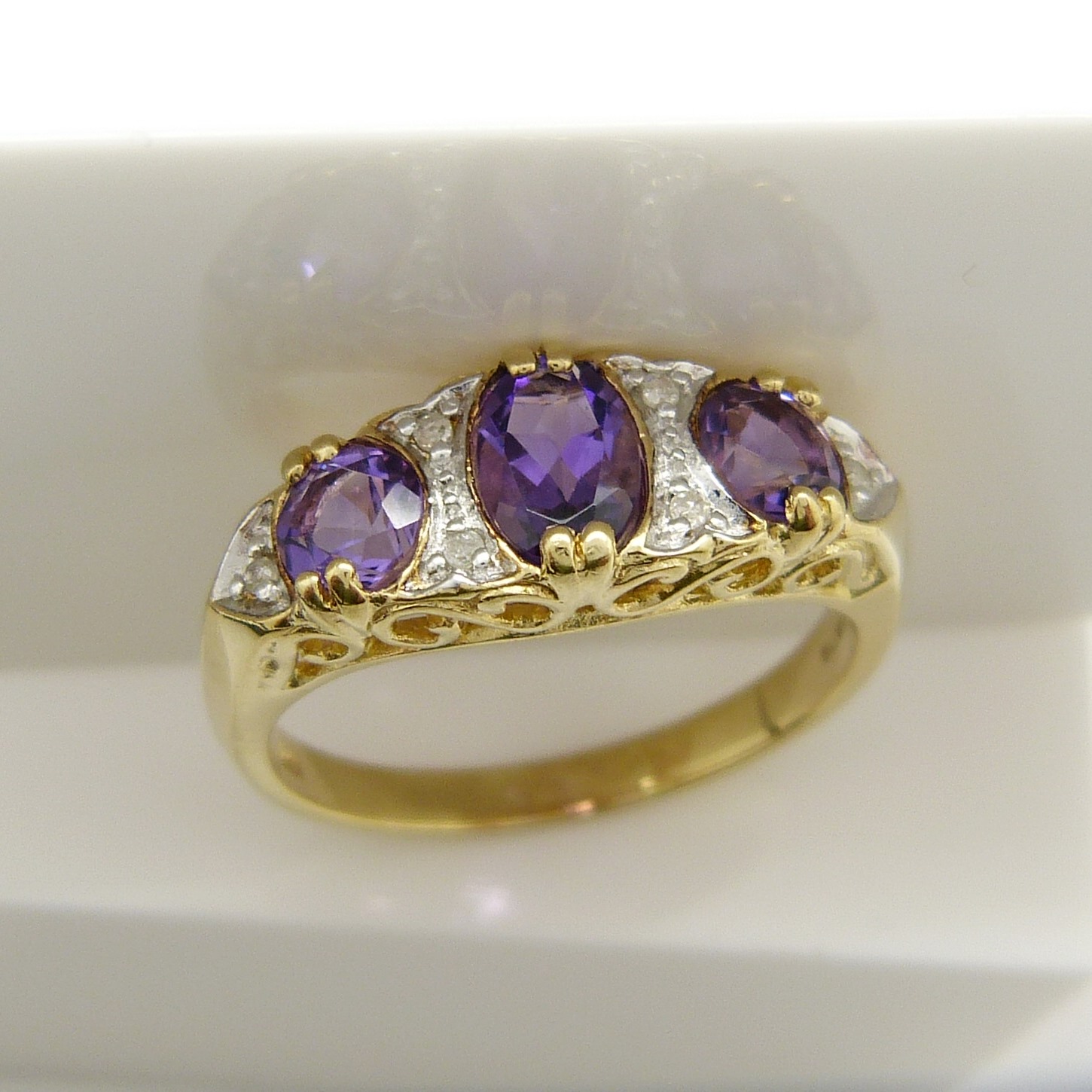 A Victorian-style dress ring set with amethysts and diamonds in 9ct yellow gold - Image 6 of 8