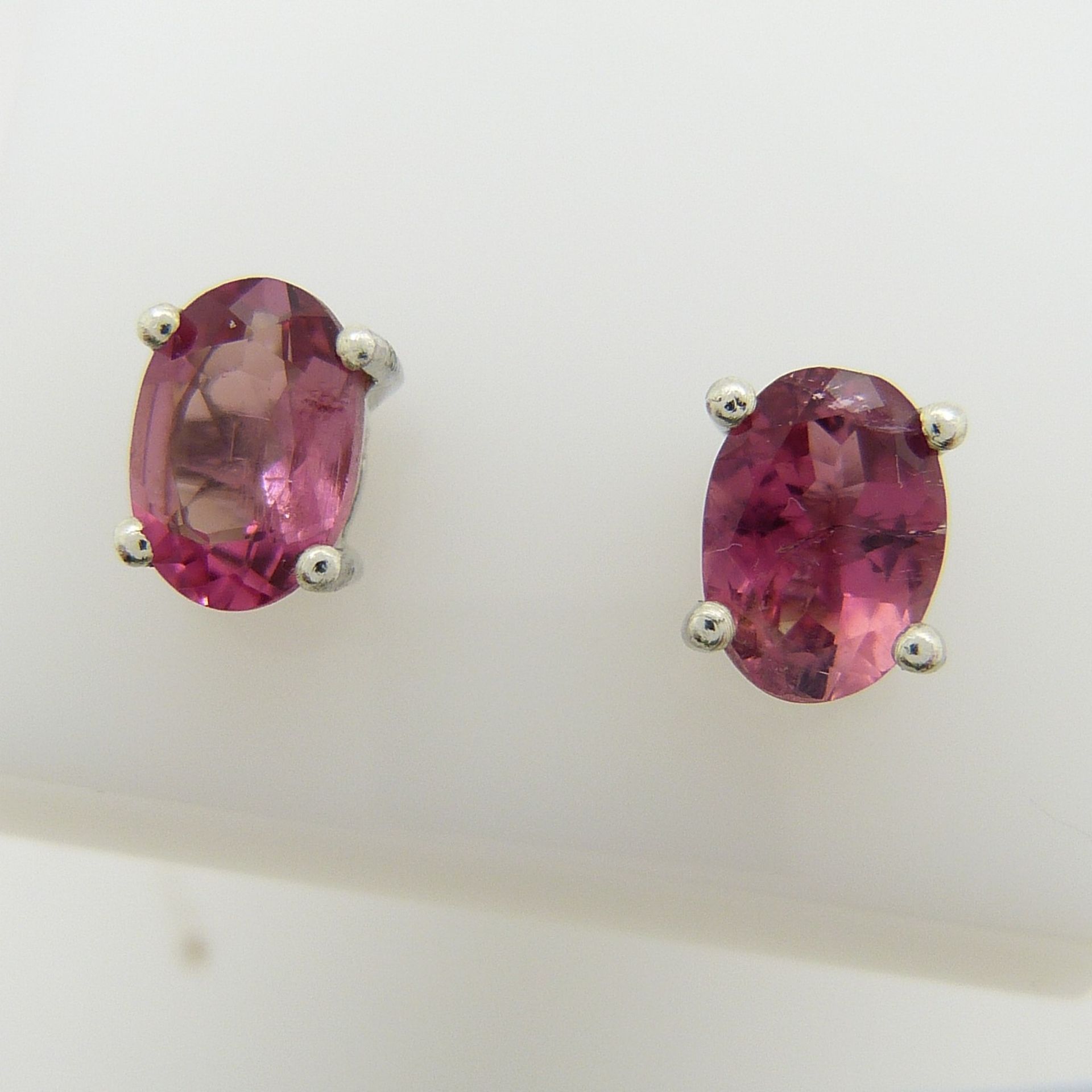 A pair of silver ear studs set with pink tourmalines, 1.30 carats (approx)