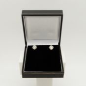 Solitaire round brilliant-cut diamond studs of 2.53 carats, boxed