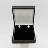 Solitaire round brilliant-cut diamond studs of 2.53 carats, boxed