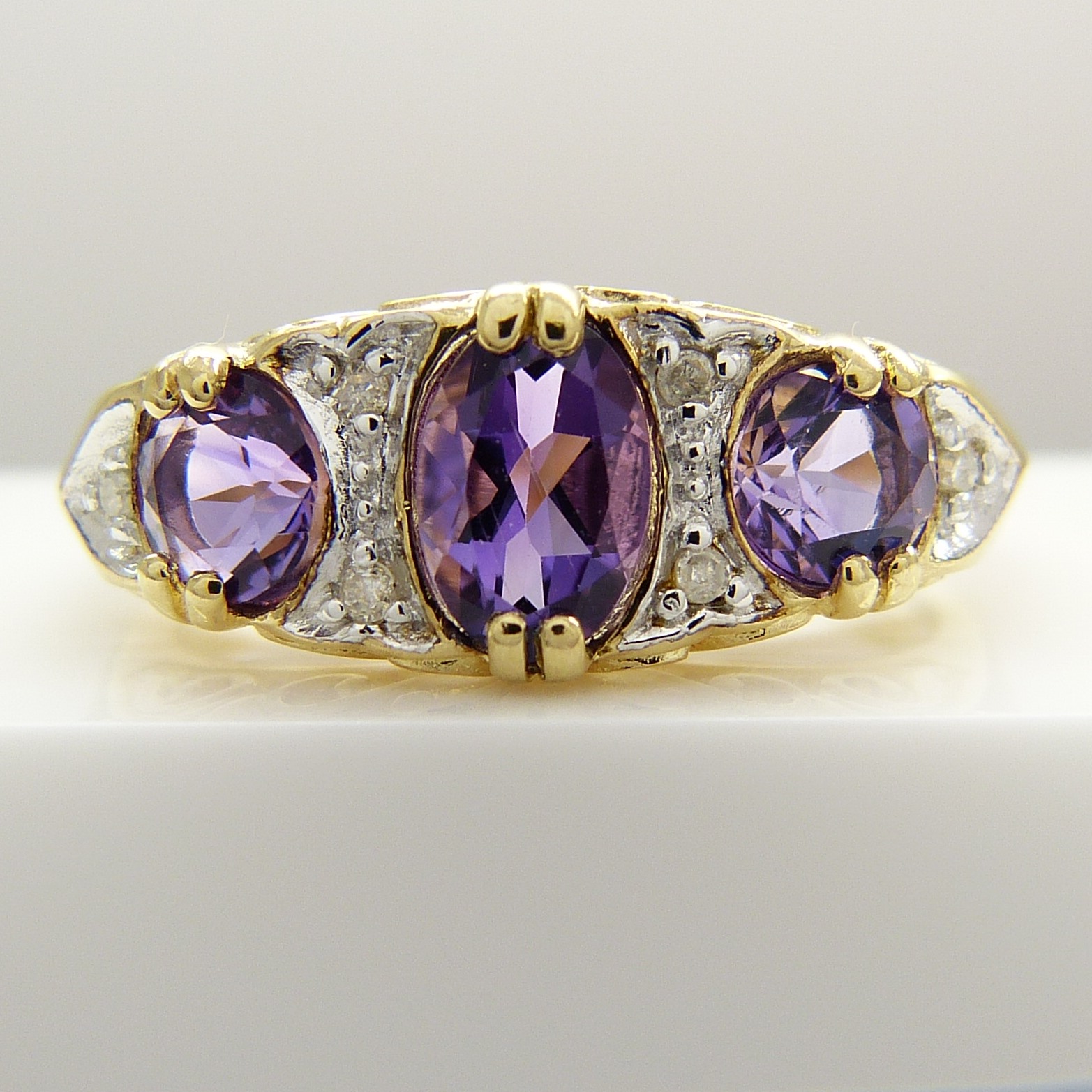 A Victorian-style dress ring set with amethysts and diamonds in 9ct yellow gold - Image 2 of 8