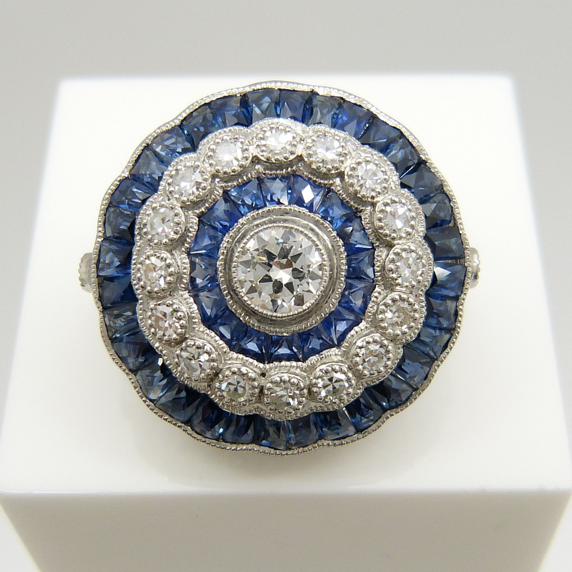 A large platinum floral-style diamond and sapphire cocktail ring - Image 6 of 7