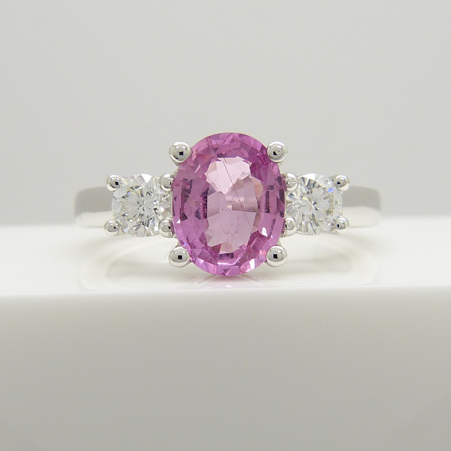 18ct white gold oval-cut pink sapphire and round brilliant-cut diamond dress ring - Image 2 of 5