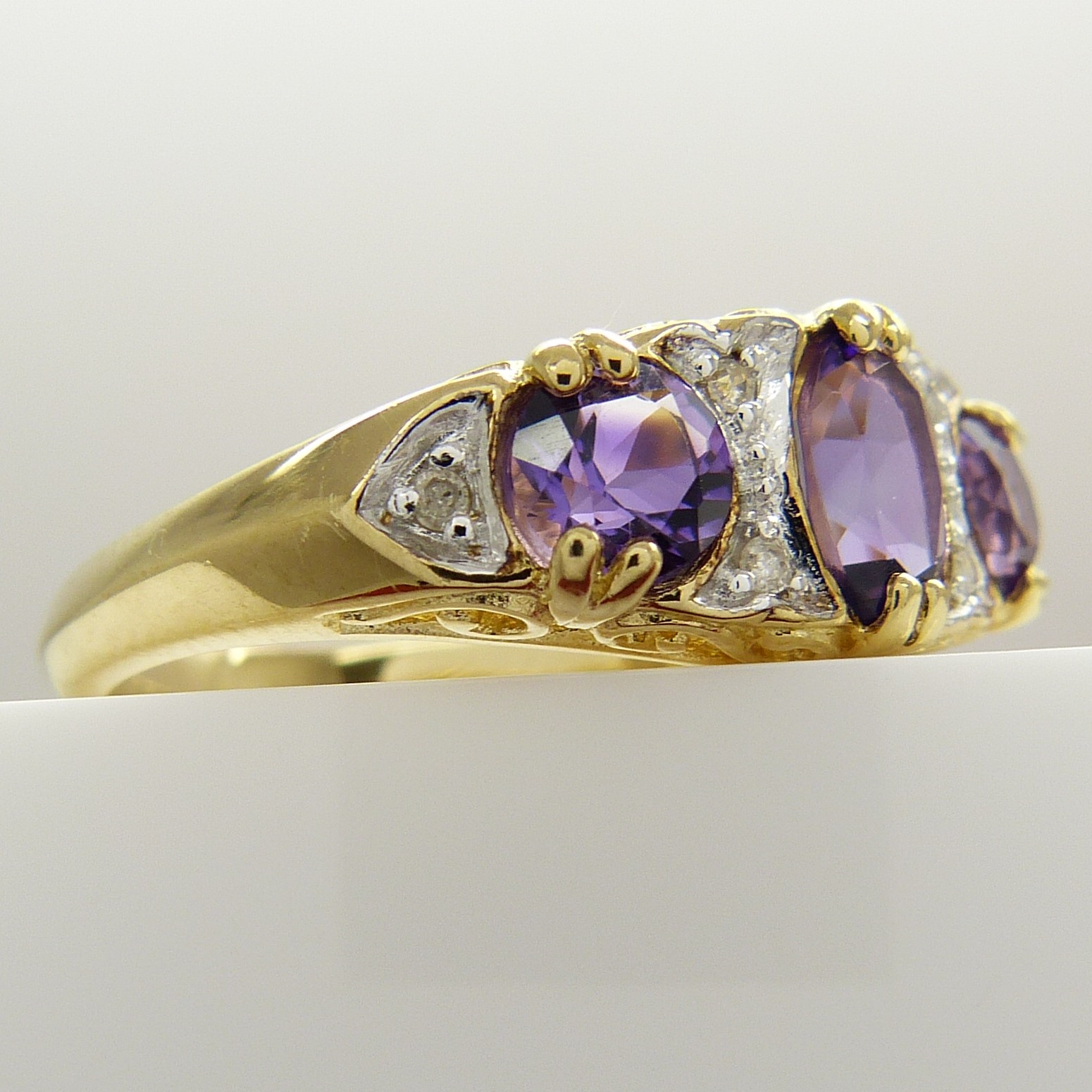 A Victorian-style dress ring set with amethysts and diamonds in 9ct yellow gold - Image 4 of 8
