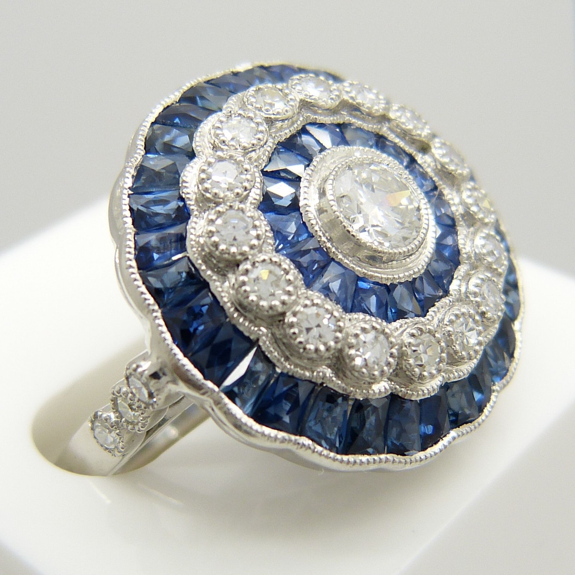 A large platinum floral-style diamond and sapphire cocktail ring - Image 4 of 7