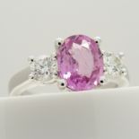18ct white gold oval-cut pink sapphire and round brilliant-cut diamond dress ring