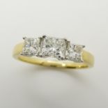 1.00 carat princess-cut diamond trilogy ring in 18ct yellow and white gold