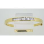 18ct (750) Yellow Gold +/- 1.0ct Baguette Diamond Hinged Oval Bangle