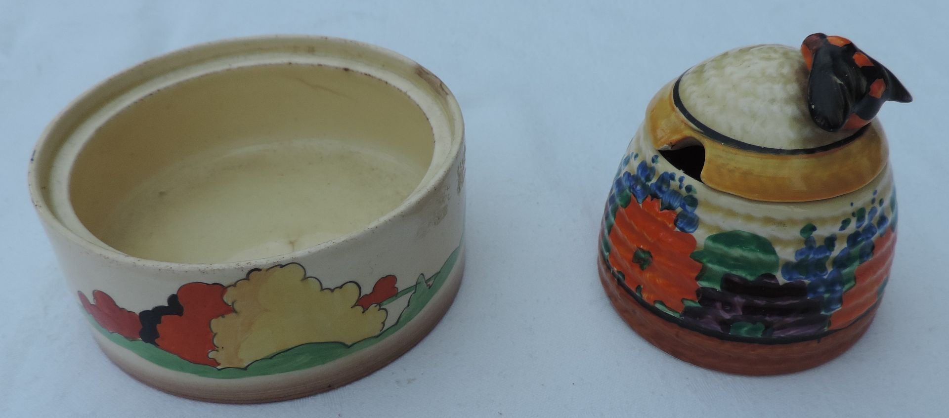 Clarice Cliff Honey Pot and Lid, together with another Clarice Cliff Pot