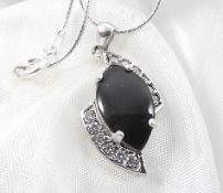 Silver necklace with black onyx pendant