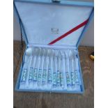 Boxed set of oriental cake forks and spoons