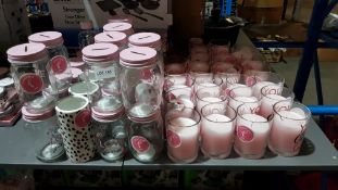 Approx 70 Tickled Pink Items. To include Candles, Vases & Money Jars