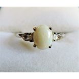 Sterling Silver 1.10 carat Opal & Topaz Ring