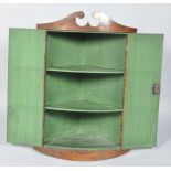 C19th bow fronted cupboard