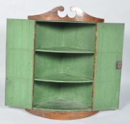 C19th bow fronted cupboard