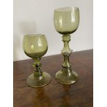 Two green wine goblets