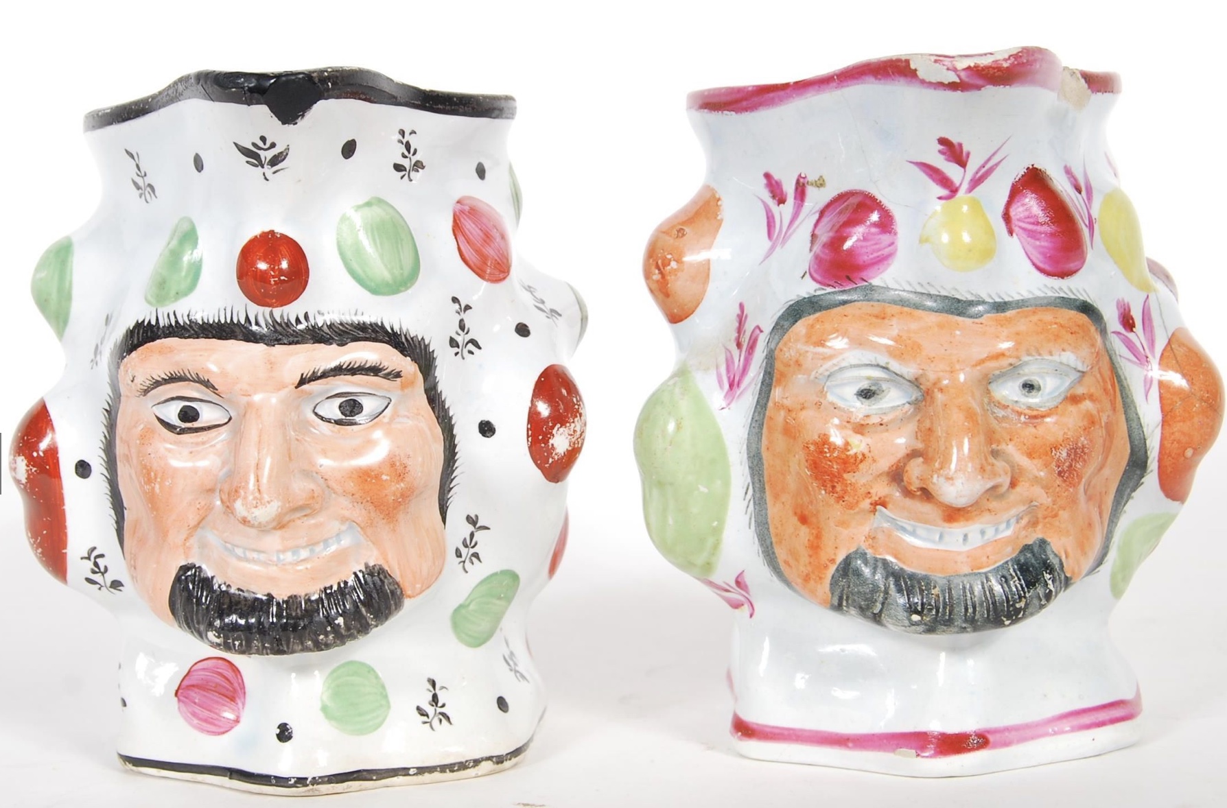 Two prattware satyr mask jugs