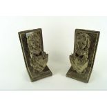 Pair of cast stone bookends