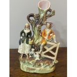 C19th small Staffordshire figurative group of a couple