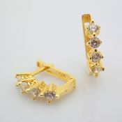 14K Yellow Gold Earring - Swarovski Zirconia .