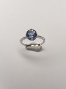 9Ct Gold Blue And White Topaz Ring