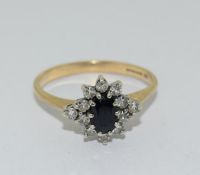 9 Ct Yellow Gold Oval Sapphire 12 Diamond Ring