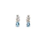 9ct White Gold Diamond And Blue Topaz Earrings