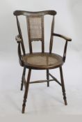 Antique Carved Wood Cane Seated Armchair