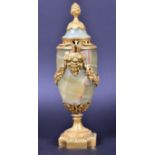 A French onyx and gilt metal incense burner and cover, cast with satyr heads and grape vines,