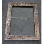 A large carved oak frame possibly Indian