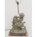 1930s classical style brass and onyx table lamp in the form of putto with goat