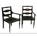 A pair of Regency style ebonised and painted carver chairs