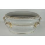 A 19th Century white glazed pottery foot bath