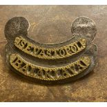 Silver hallmarked backed Crimean war military badge with the words Sebastopol and balaclava i