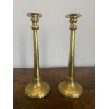 Pair of tall edwardian brass candlesticks measuring 28 x 10cms