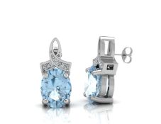 9ct White Gold Diamond And Blue Topaz Earrings