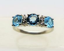 Blue Topaz and Diamond Ring