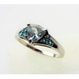 1.1 carat Trillion Cut Aquamarine & Topaz Ring