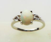 1.10 carat Opal & Topaz Ring