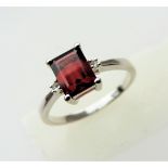 1.75 carat Emerald Cut Garnet & Topaz Ring