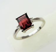 1.75 carat Emerald Cut Garnet & Topaz Ring