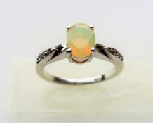 Opal & White Topaz Ring in Sterling Silver